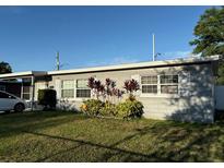 Charming single-story home featuring well-maintained landscaping and a freshly painted exterior at 815 S Solandra Dr, Orlando, FL 32807
