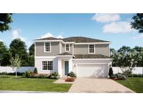 Charming two-story home with a two-car garage, manicured lawn, and inviting curb appeal at 1755 Columbus Path, St Cloud, FL 34771
