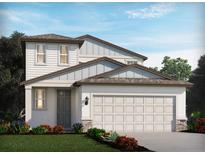 Charming two-story home with a two-car garage, beautiful landscaping and a modern design at 2774 Virginia Pine Dr, Bartow, FL 33830
