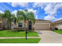 Charming single-Gathering home with well-manicured lawn and lush palm trees in a desirable neighborhood at 1711 Penrith Loop, Orlando, FL 32824