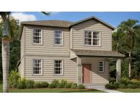 Two-story tan home with multiple windows and covered front porch at 2342 Broadbrook Drive, St Cloud, FL 34771