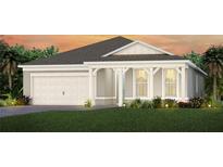 Charming home with a two-car garage, covered entry, and well-maintained landscaping at 2749 Serenity Meadow Dr, Kissimmee, FL 34744
