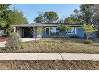Charming single-story home with well-maintained lawn and mature trees at 1656 Brentlawn St, Deltona, FL 32725