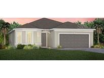Charming single-Gathering home with a well-manicured lawn and attached two-car garage at 2729 Serenity Meadow Dr, Kissimmee, FL 34744