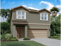 Charming two-story home features a neutral color palette and a two-car garage at 1433 Dalkeith Cv, Sanford, FL 32771