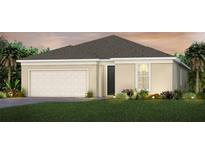 Charming single-story home featuring a two-car garage, neutral palette, and beautifully landscaped front yard at 2725 Serenity Meadow Dr, Kissimmee, FL 34744