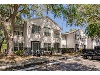 Charming two-story condo with fresh exterior paint, covered parking, and mature tree in a desirable community at 4340 S Kirkman Rd # 901, Orlando, FL 32811