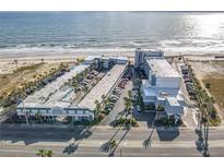 Breathtaking aerial view of the resort with stunning ocean views and beach access at 935 S Atlantic Ave # 602, Daytona Beach, FL 32118
