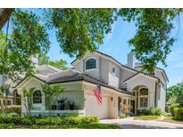 Charming two-story home boasts a neutral color palette, well-manicured landscaping, and an attached two-car garage at 1275 Glencrest Dr, Lake Mary, FL 32746