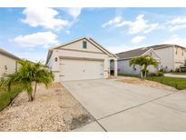 Charming single-Gathering home with a well-maintained lawn, stone accents, and a two-car garage at 3065 Timber Hawk Cir, Ocoee, FL 34761