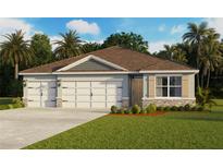 Charming single-story home featuring a three-car garage, stone accents, and professionally landscaped yard at 4497 Yaupon Holly Way, Lakeland, FL 33811