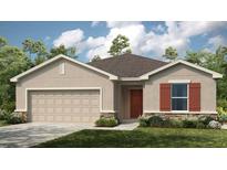 Single Gathering home with stone accents, tan siding, a 2 car garage, brown roof, and manicured landscaping at 4928 Bluebell Ct, Lake Hamilton, FL 33851