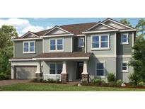 Inviting two-story home featuring a covered porch and a two-car garage at 536 Moon Shell Cir, New Smyrna Beach, FL 32168