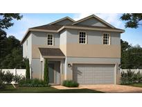 Charming two-story home featuring a two-car garage and neutral color scheme with manicured landscaping at 6712 Golden Eagle Blvd, Howey In The Hills, FL 34737