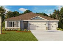 Charming single-story home showcasing stone accents, a well-manicured lawn, and a convenient two-car garage at 5227 Ligonberry St, Lakeland, FL 33811