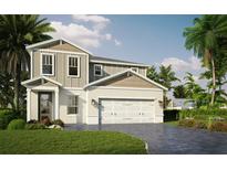 Inviting two-story home with a gray-beige exterior, complemented by lush landscaping and a brick-paved driveway at 106 Elena Lavin Cir # 19, Orlando, FL 32807