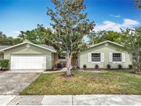 Charming single-story home featuring a well-manicured lawn and inviting front entrance at 236 N Ranger Blvd, Winter Park, FL 32792