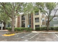 Attractive apartment building featuring multiple stories, exterior stairs, and handicap parking at 2214 Metropolitan Way # 1032, Orlando, FL 32839