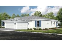 Charming single-story home with a two-car garage, complemented by well-maintained landscaping and blue shutters at 5362 Spoonflower Ct, St Cloud, FL 34771