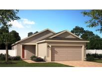 Charming single-story home with a two-car garage, brick walkway, and well-manicured landscaping at 876 Scrub Oak Hammock Rd, Davenport, FL 33837