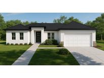 Charming single-story home featuring a modern exterior, well-manicured lawn, and attached two-car garage at 6168 Sw 154Th St, Ocala, FL 34473