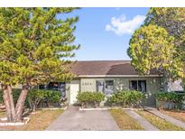 Charming single-story home featuring tidy landscaping and a welcoming front entrance with a defined walkway at 2504 London Bridge Ct, Orlando, FL 32837