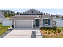 Charming single-story home featuring a two-car garage and inviting curb appeal at 2515 W End Dr, St Cloud, FL 34772