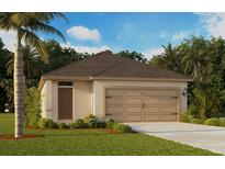 Charming single-story home with a two-car garage, lush landscaping, and a well-manicured lawn at 8379 Madrid St, Lakeland, FL 33810