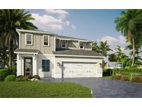 Charming two-story home with a lush green lawn, brick driveway, and attached two car garage at 106 Elena Lavin Cir # 39, Orlando, FL 32807
