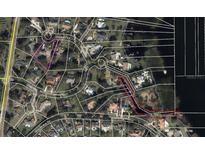 Aerial view of a waterfront community with large lots and mature trees at 11056 Clipper Ct, Windermere, FL 34786