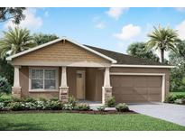Charming single-Gathering home featuring a covered front porch and a two-car garage at 13248 Pergola Ave, Orlando, FL 32832