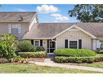 Charming home with well-manicured landscaping, a cozy entrance, and a neutral color palette at 1136 Villa Ln # 96, Apopka, FL 32712