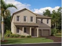Charming two-story home featuring a covered front porch and two-car garage at 22113 Amberbush Ct., Mount Dora, FL 32757