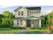 Charming two-story home with a well-manicured lawn and beautiful landscaping at 10043 Dulbecco St, Orlando, FL 32827