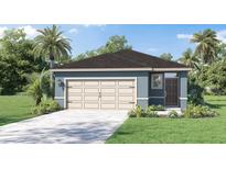 Inviting one-story home with a two-car garage, featuring a well-manicured lawn and tropical landscaping at 198 Amberwood Way, Umatilla, FL 32784