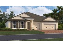 Charming one-story home with a three-car garage, beautiful landscaping, and a classic design at 2703 Ravencliffe Ter, Oviedo, FL 32765