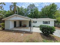 Charming single-story home featuring a covered front porch, fresh paint, and a well-maintained landscape at 356 Oakhurst St, Altamonte Springs, FL 32701