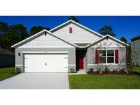 Charming single-Gathering home with a well-maintained lawn and a two-car garage, offering curb appeal at 5063 Tana Ter, St Cloud, FL 34772