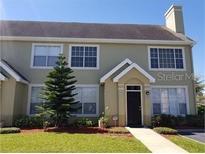 Attractive two-story home featuring traditional architectural details and well-maintained landscaping at 8973 Lee Vista Blvd # 2308, Orlando, FL 32829