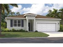 Charming single-story home with well-manicured lawn and attached two-car garage at 3586 Dahlia Dr, Lake Hamilton, FL 33851