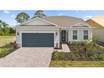 Charming single-Gathering home with a brick paved driveway and well-maintained landscaping at 8105 Fenton St, Orlando, FL 32836