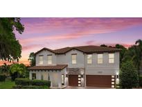 Stunning two-story home with a tile roof, stone accents, and a meticulously manicured front yard at 4509 Patricia Ann Ct, Orlando, FL 32839