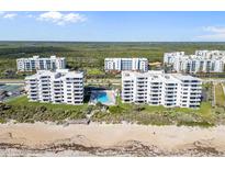 Stunning oceanfront condos with private balconies and a refreshing community pool at 5301 S Atlantic Ave # 51, New Smyrna Beach, FL 32169