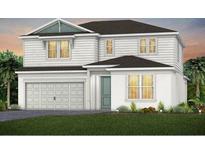 New two-story home with white siding, attached garage, and manicured front lawn at 5615 Wood Bridge Pl, St Cloud, FL 34771