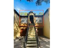 Charming townhome featuring a private entrance and convenient garage access at 6328 Raleigh St # 816, Orlando, FL 32835