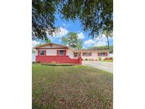Charming single-story home with brick accents and a well-manicured front lawn at 1603 Gaston Foster Rd, Orlando, FL 32812