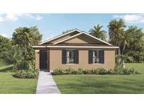 Charming single-story home with a well-manicured lawn and tropical landscaping including mature palm trees at 5282 Scrub Mint Ln, Apopka, FL 32712