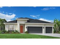 Charming single-story home featuring a two-car garage, landscaped yard, and a modern design at 1043 Gloryland Ct, Sanford, FL 32771