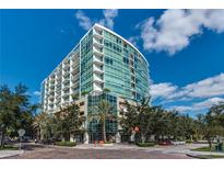 Modern high-rise building with walls of glass and private balconies providing incredible views at 101 S Eola Dr # 621, Orlando, FL 32801