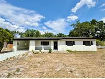 Charming single-story home with a well-maintained exterior and front porch at 2007 N Hastings St, Orlando, FL 32808